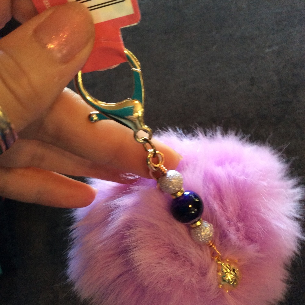 Purple pompom with beads and ladybug key ring